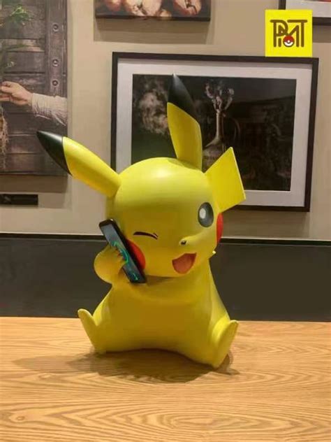 giant pikachu wireless phone charger.